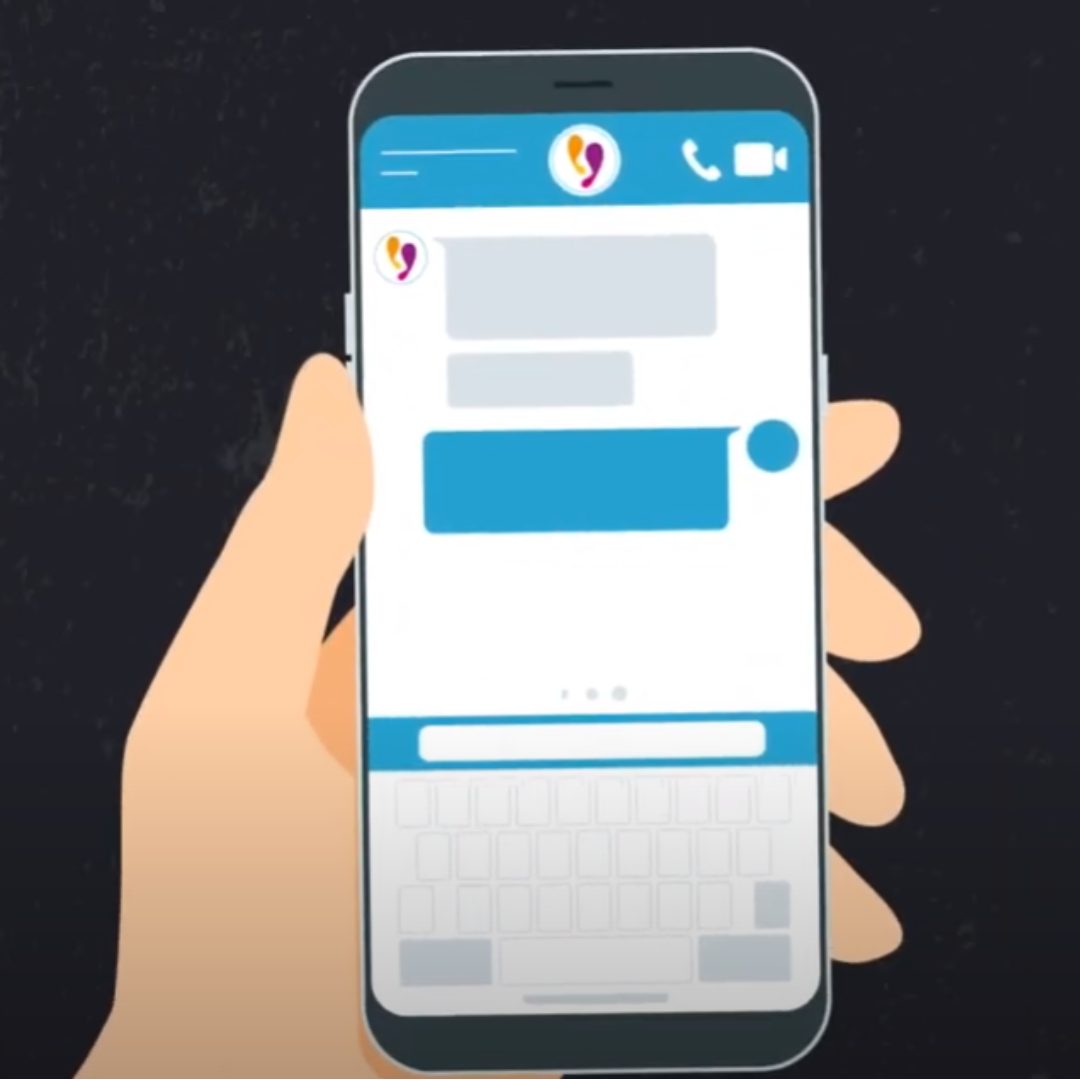 Illustration of a hand holding a mobile phone showing text messages on the screen and the Live Fear Free Helpline logo. 