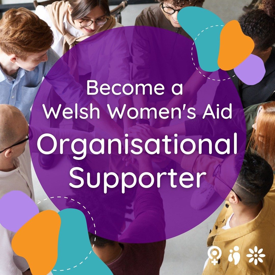 Image with text: Become a Welsh Women's Aid Organisational Supporter over a photograph of people standing in a circle with their hands overlapping in the centre. 